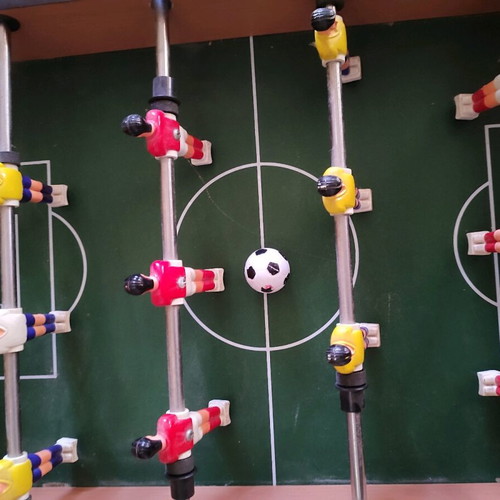 Wooden foosball table used with 1 ball, missing two plastic handles