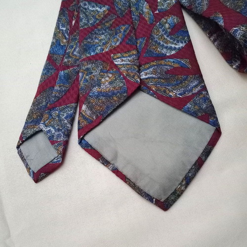 Silk tie 10cm like new, red with multicolor pattern
