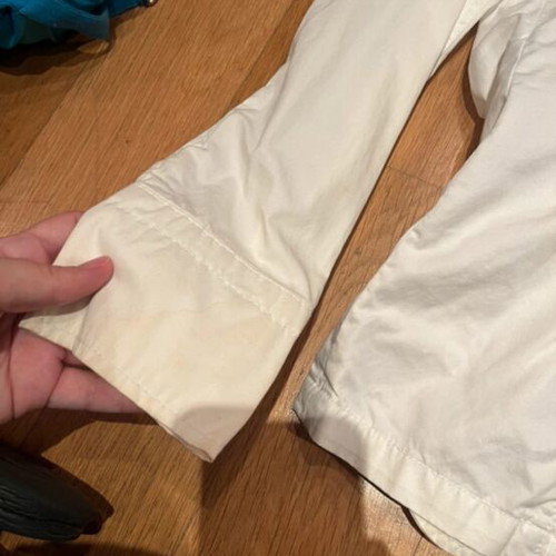 White jacket used size M with stains on sleeves