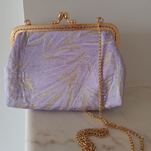 Vintage shoulder bag new in purple and gold shades with floral lining