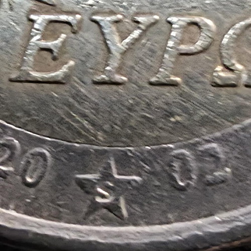 2 Euro 2002 Greece coin with 4 minting errors