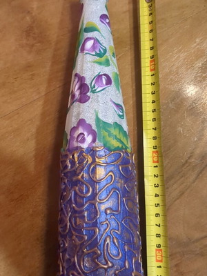 Hand-painted bottle used with embossed patterns