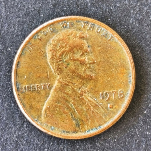 One cent 1978 used with double struck D error