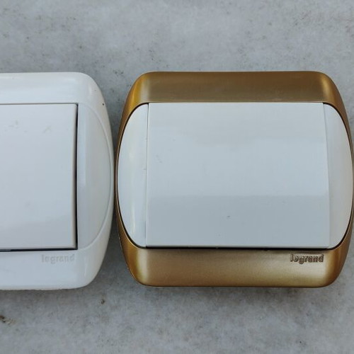 Legrand electrical switches and sockets set, gold-white and white-white