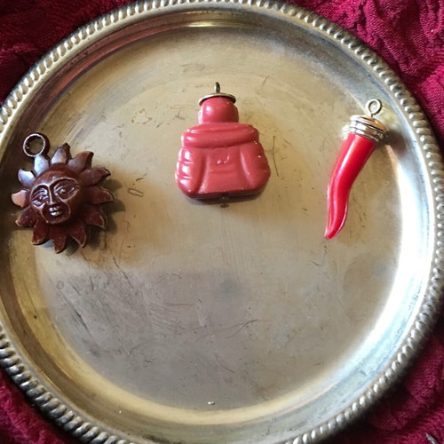 3 small bakelite charm amulets new
