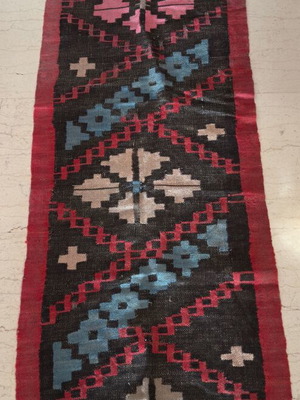 Handmade woven runner used with traditional black, red and blue kilim