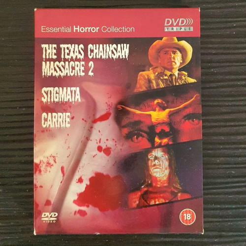 Essential Horror Collection Box Set used DVD with The Texas Chainsaw Massacre 2, Stigmata, Carrie