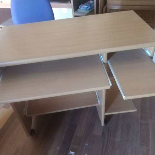 Computer desk with used office chair and wheels