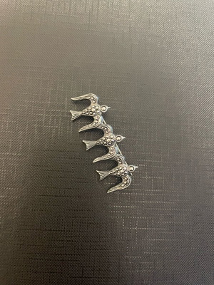 Vintage brooch with swallows and subtle rhinestones silver like new
