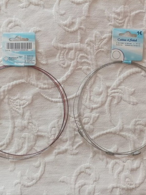 Steel necklace set new, 2 sets with 3 wire necklaces each