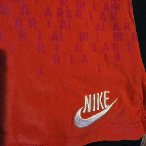 Nike sports top coral like new, elastic