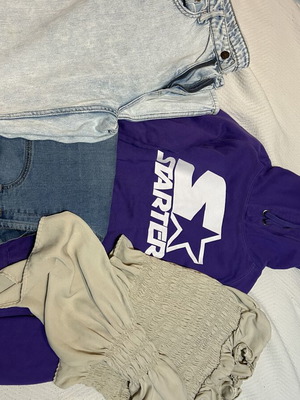 Clothing set like new with pants, blouses, and sweatshirts