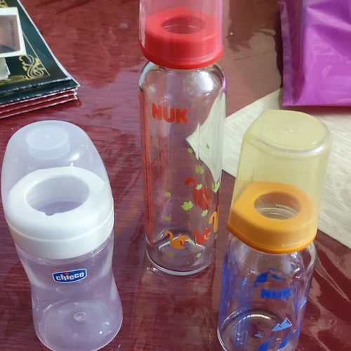 Baby bottles used, 2 glass and 1 plastic Nuk & Chicco