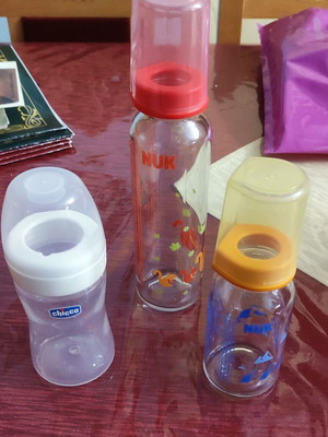 Baby bottles used, 2 glass and 1 plastic Nuk & Chicco