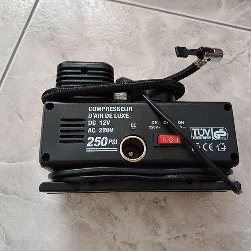 AC/DC electric air compressor used, ideal for inflating tires and more