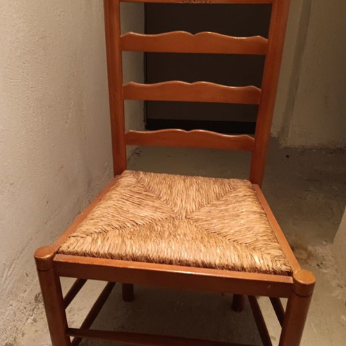 Wooden chair used with cane seat and embossed wood