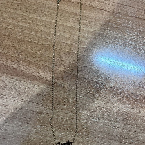 Elizabeth pendant necklace stainless steel, like new, gold color