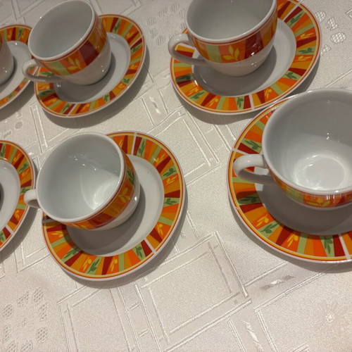 Vintage set of 6 cups and 6 saucers with bright colors, unused