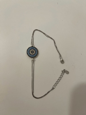 Silver bracelet with blue eye design like new