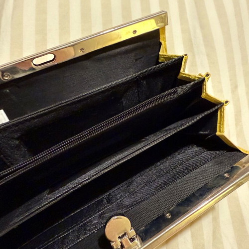 Clutch wallet like new, yellow, bought from NY