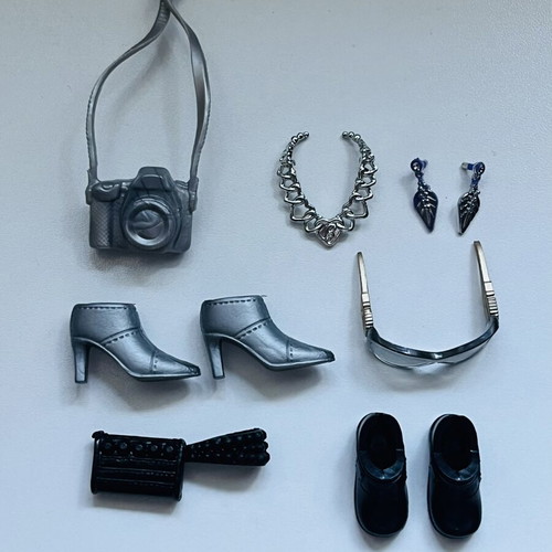 Doll accessories like new, small silver and black set