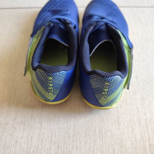 Kipsta kids football shoes used, size 32, blue and yellow
