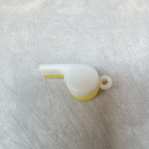 Plastic whistle collectible toy from 1970s, used