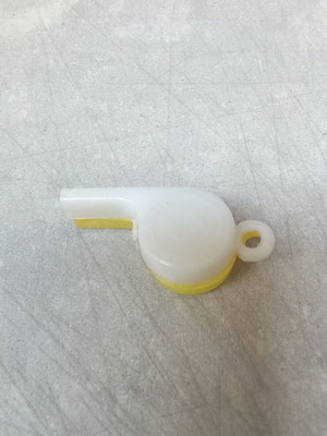 Plastic whistle collectible toy from 1970s, used