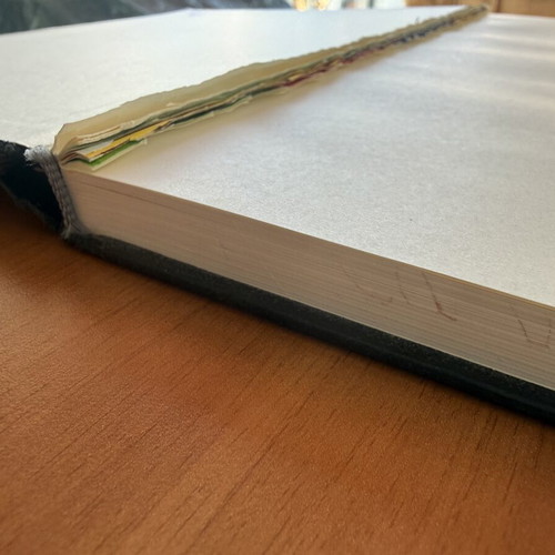 Black sketchbook with fabric cover, 127 sheets