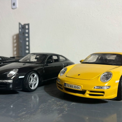 Porsche Carrera yellow 1:18 like new with hazy front windshield