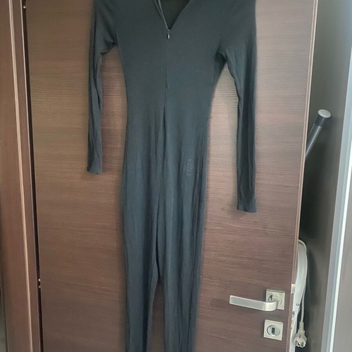Black ribbed one-piece jumpsuit like new with zipper