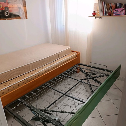 Single bed with used sliding bed and metal frame