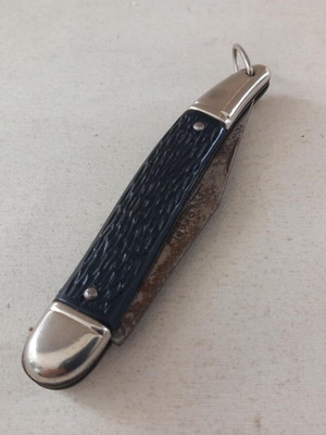 Okapi German pocket knife used with blade oxidation