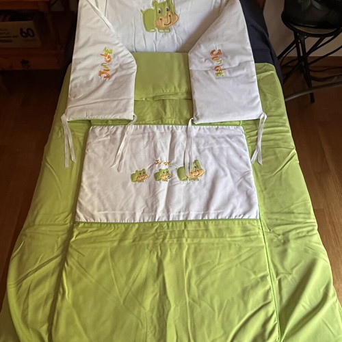 Crib bedding set 3 pieces with green hippopotamus motif, like new