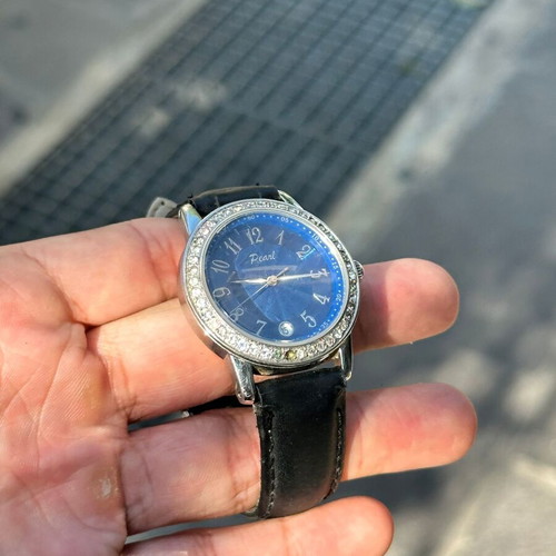 Vintage Pearl wristwatch with blue dial and stones