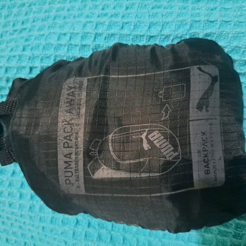 Puma backpack like new, black, lightweight and travel-friendly
