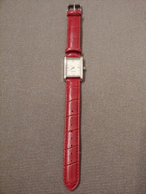 Oriflame wristwatch used, red with leatherette strap