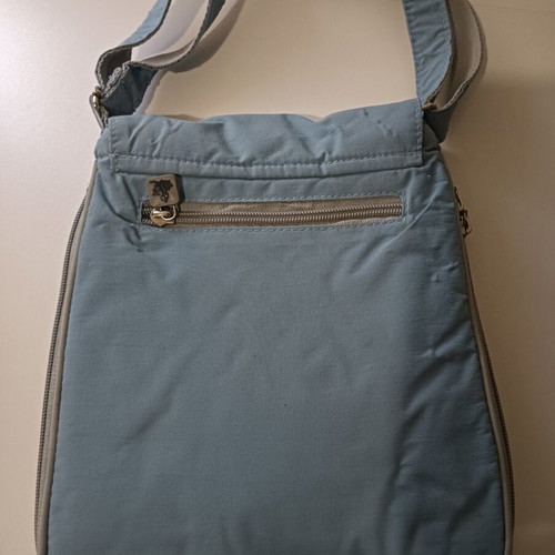 Fabric crossbody bag used, turquoise color