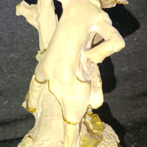 Vintage decorative figurine with children, used