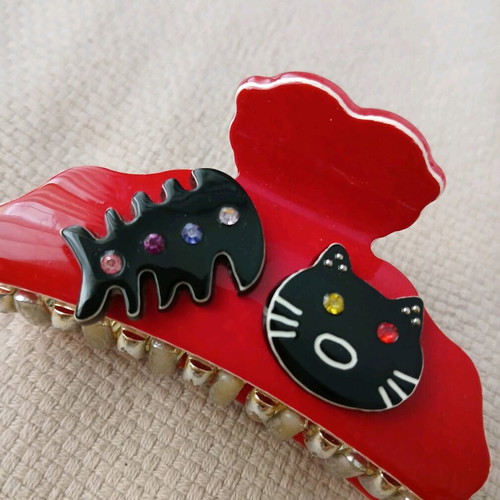 Artstar hair clip red with cat design like new