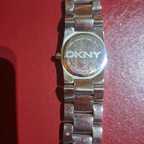 DKNY women's watch used, stainless steel with turquoise dial