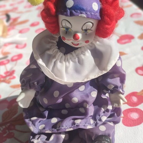 Vintage porcelain clown doll used