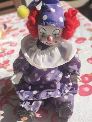 Vintage porcelain clown doll used