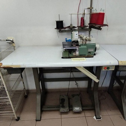 Cutting and Overlock Sewing Machines used, 2 cutting and 2 overlock