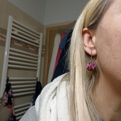 Pon pon animal print fuchsia earrings used