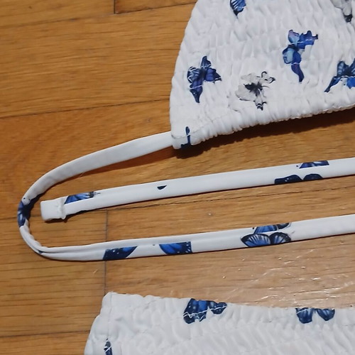 White Gofre Bikini with Blue Butterfly Design Size Medium like new