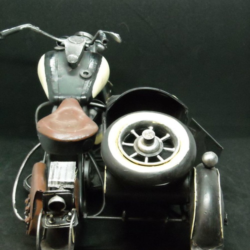 Decorative vintage Harley Davidson type motorcycle with sidecar used