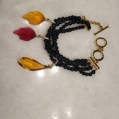 Swarovski bracelet with volcanic lava stones and leaf-shaped crystals