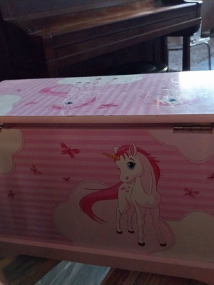 Wooden unicorn toy box with defect