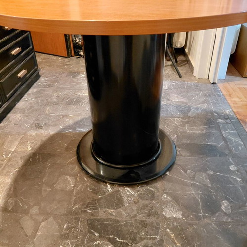 Round wooden table with black metal base like new